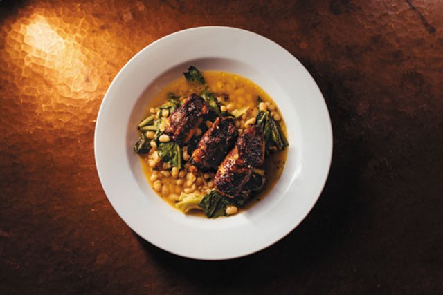 Feature_BestRestaurants_RestaurantAdarra_Stuffed-squid_white-beans_greens_ShawneeCustalow_rp1219_teaser.jpg