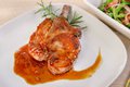 pork-chop-w-peaches_GettyImages-1252032662.jpg